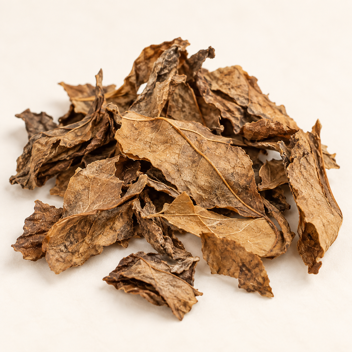Visuel illustratif du contenu : feuilles de Djeka séchées. La quantité représentée ne définit pas le contenu de la commande.